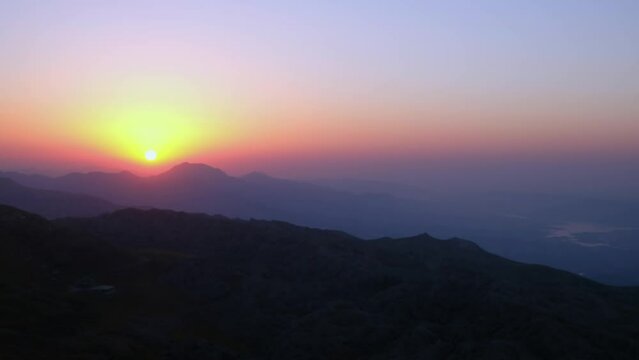 Sun above mountain range. Scenic view of sunrise in a mountainside. Nemrut Dagi National Park, Adiyaman province, Turkiye