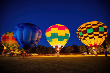 Naklejka premium Night view of the Firelake Fireflight Balloon Festival event