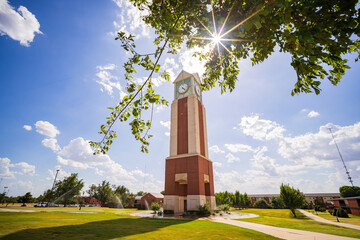 Sunny view of the Freede Centennial Tower of Oklahoma Christian University