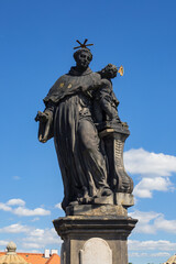 Fototapeta na wymiar Statue of Anthony of Padua, Charles Bridge, Prague