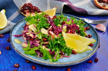 Salad with shrimp and pomegranate.