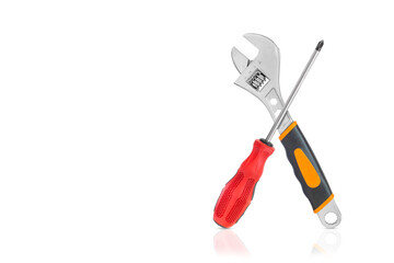 Repair. Screwdriver and wrench on a white background.