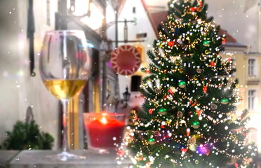 Christmas tree decotaion and candle light  on street in medieval city Tallinn old town 