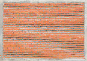 Red bricks wall with cement frame