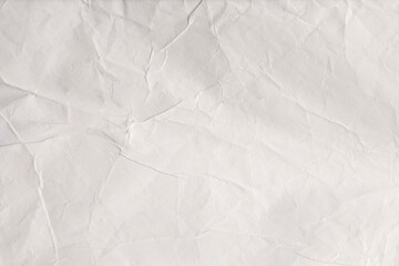 Crumpled wet craft paper blank texture copy space background.