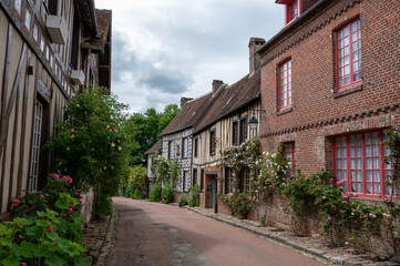 One of most beautiful french villages, Gerberoy - small historical village with half-timbered houses and colorful roses flowers, France