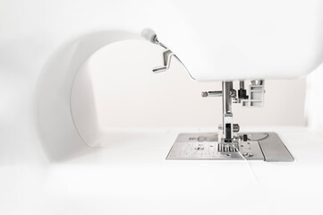 White sewing machine, handmade and crafts concept.