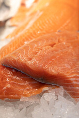 Organic wild scottish fish salmon cleaned on ice on market