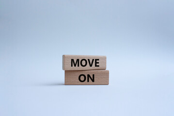 Move on symbol. Wooden blocks with words Move on. Beautiful white background. Business and Move on concept. Copy space.