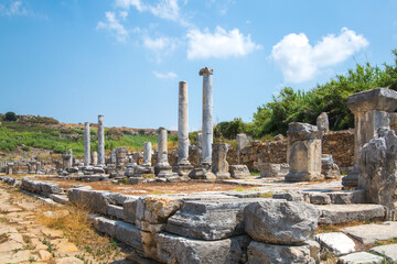 Perge, Colonnaded street and a water channel runs in the middle of the street from the Nymphaion fountain. Foot bridge. Dated by period of the Emperor Hadrian 334 BC. Turkey