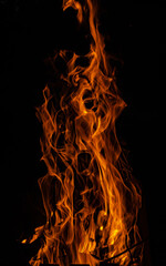 Bonfire flame on black isolated background