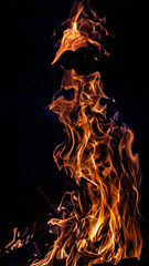 Bonfire flame on black isolated background
