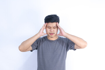 Asian men suffers from headaches, migraines and stress, health problems