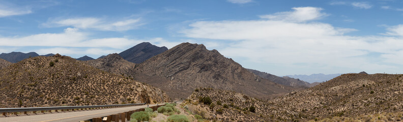 American Mountain Landscape in the desert. Sunny Cloudy Sky. Nevada, United States of America. Nature Background