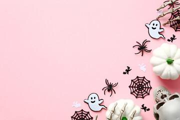 Cute Halloween decorations on pastel pink background. Happy Halloween holiday concept. Flat lay, top view, copy space