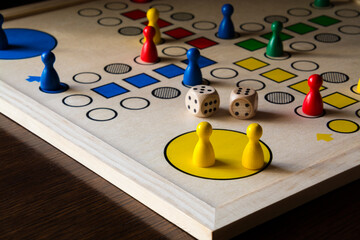 Ludo board game playing on a table