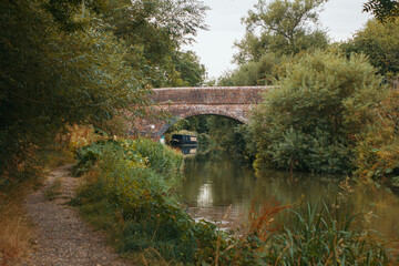 Fototapeta na wymiar A bridge over the Kennett & Avon Canal near Great Bedwyn in Wiltshire.