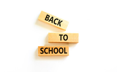 Back to school and support symbol. Concept words Back to school on wooden blocks. Beautiful white table white background. Business, educational Back to school concept. Copy space.