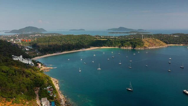 sunset light phuket island famous naiharn beach yacht dock coastline aerial panorama 4k timelapse thailand