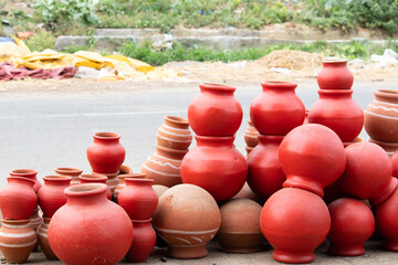 Handmade Terracotta Ceramic Clay-Based Earthenware Used For Cooking Or Storing Food And During Traditional Festival Celebration In India. Piled Up Variety Of Unglazed Or Glazed Hard, Fired Ceramic