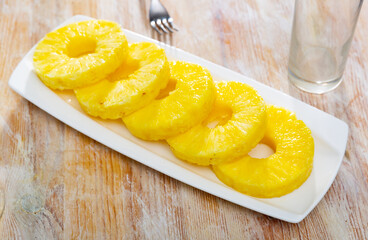 Beautifully laid out canned pineapple for dessert on a plate. High quality image
