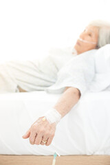 old patient woman sleep on bed, solution treatment prepare
