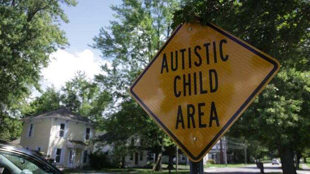 Autistic Child Area roadsign with video panning left to right.