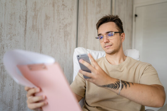 One man caucasian male businessman work at office desk analyze data - Powered by Adobe