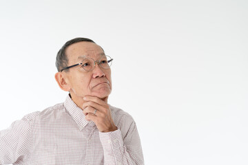 Obraz premium 考える・シニア男性