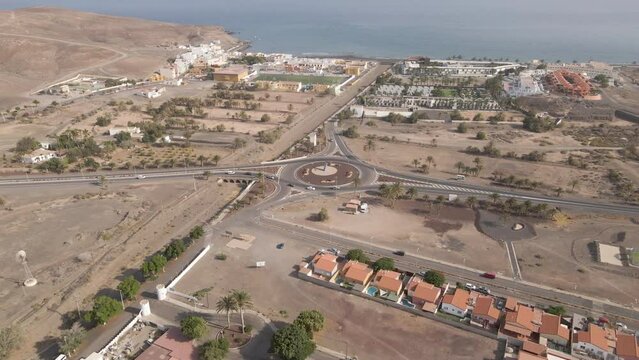 Roundabout In A Busy Town Within Fuerteventura lsland, Spain. Aerial
