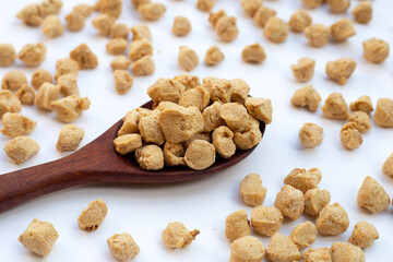 Textured soy protein on white background.