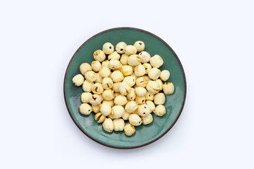 Dried lotus seeds on white background.