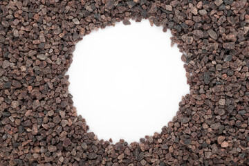 Many himalayan black salt texture for background. Empty middle.