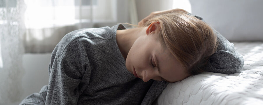 Young caucasian woman is depression and having mental problem in the bedroom at home, emotion and negative, woman loneliness and worry with disappoint, expression and hopelessness, lifestyles concept.