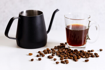 Coffee drip bag and coffee beans.