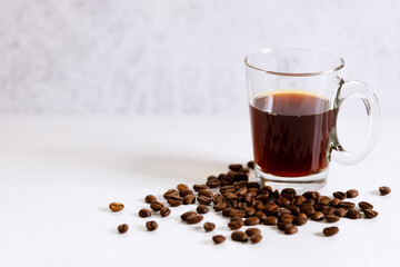 Coffee drip bag and coffee beans.