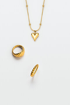 Gold Jewelry On White Background