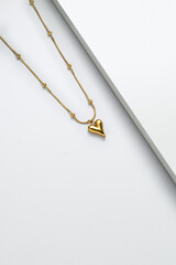 Gold jewelry on white background