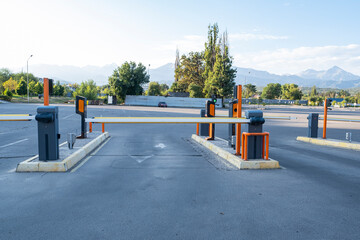 Barrier for paid parking of cars for visitors of the business center