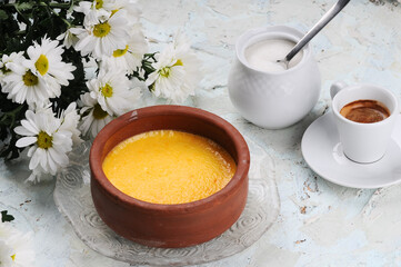 oriental hot dessert in a small clay plate macro photo
