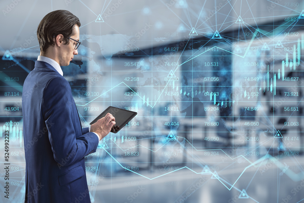 Poster businessman using tablet with abstract glowing forex chart, map and arrows on index hologram, blurry