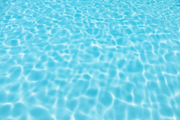 Blue water swimming pool background.