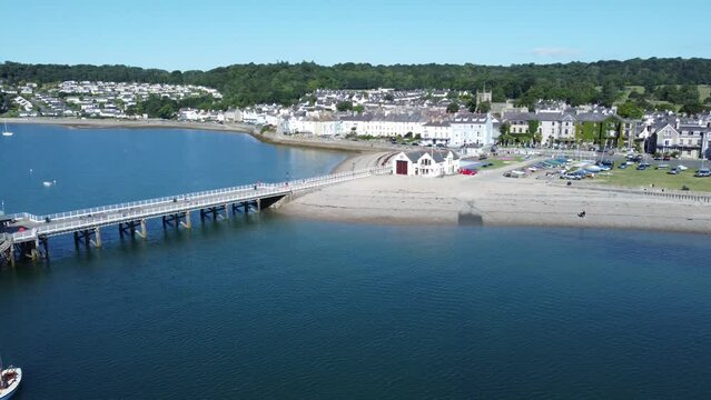 Beaumaris Pier aerial view Anglesey tourist attraction on peaceful warm coastal waterfront