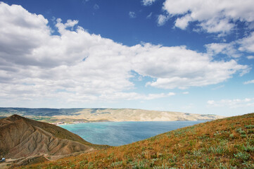 Landscape with hills on the sea shore.