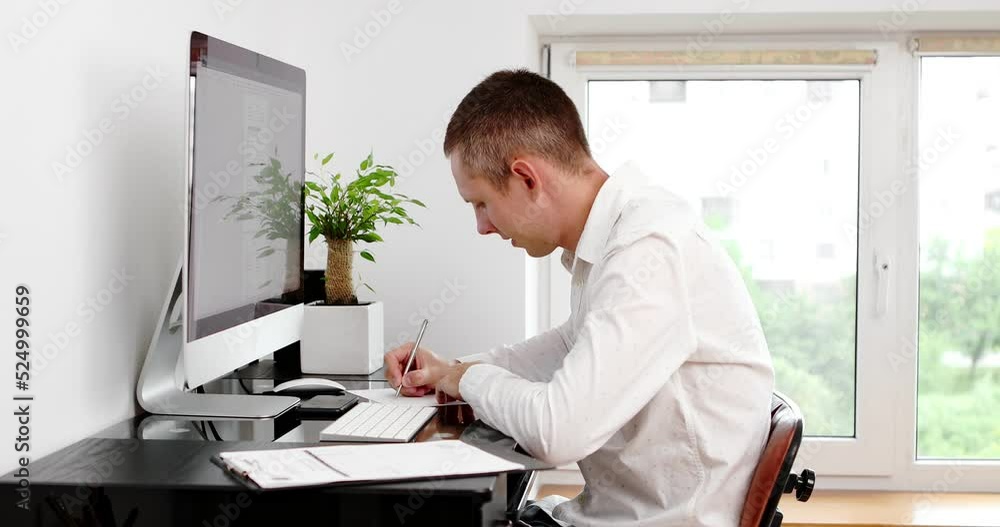 Poster businessman using computer remote distance working sitting at table