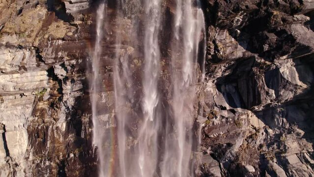 aerial drone footage raising down and pushing out at Fallbach, a stunning waterfall in Grindelwald in Switzerland