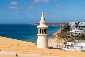 Algarve chimney. Traditional house chimney and roof from the Algarve. Salema beach, south of...