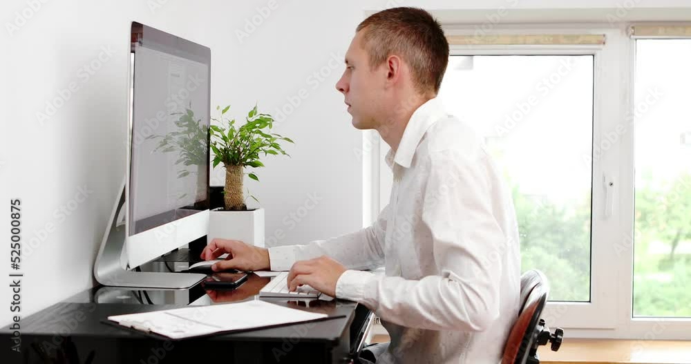 Poster businessman using computer remote distance working sitting at table