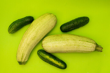 Zucchini on a green background, monochrome