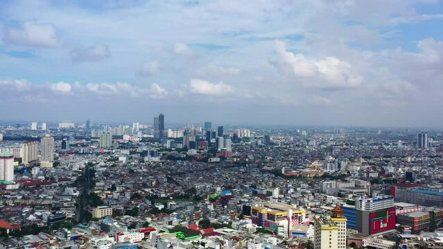 beautiful dense skyline of buildings in north Jakarta Indonesia on sunny day